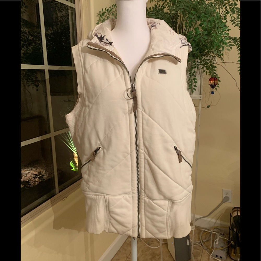 Really nice cream colored Nike Vest
